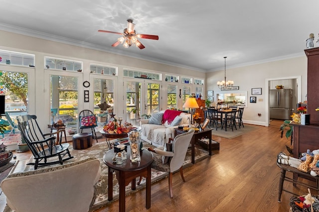 326 Coppedge Farm Rd, White Stone, VA 22578 - living area with crown molding, a ceiling fan, healthy amount of natural light, wood finished floors, and a chandelier