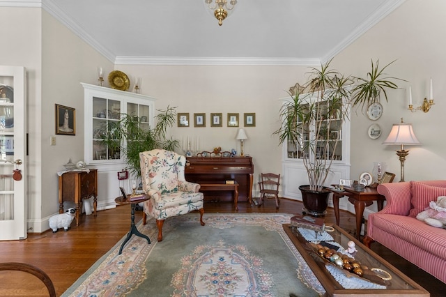 living room featuring crown molding and wood finished floors