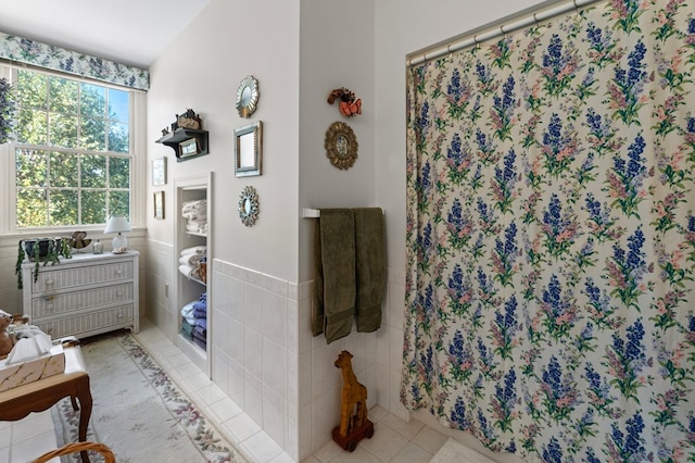 326 Coppedge Farm Rd, White Stone, VA 22578 - full bathroom featuring tile patterned flooring, tile walls, a shower with shower curtain, and vanity