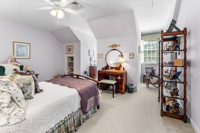 bedroom featuring vaulted ceiling, ceiling fan, visible vents, and light colored carpet