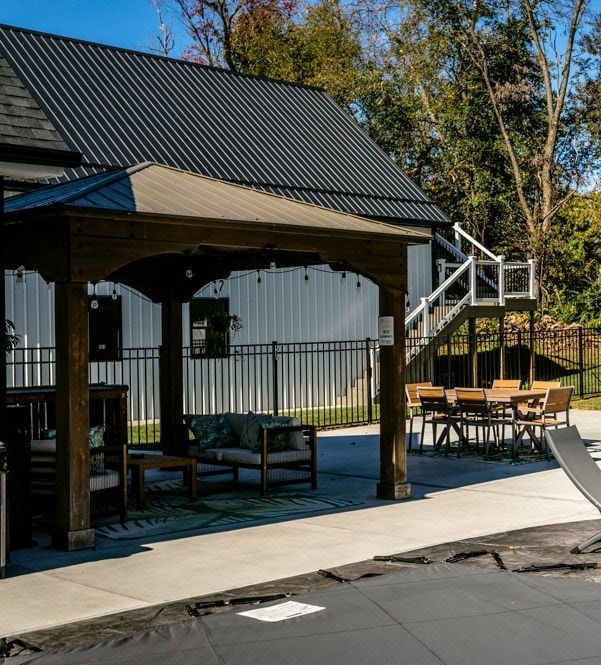 exterior space with a gazebo, an outdoor hangout area, and a patio