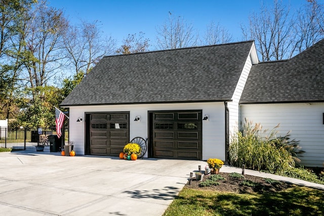 garage featuring fence