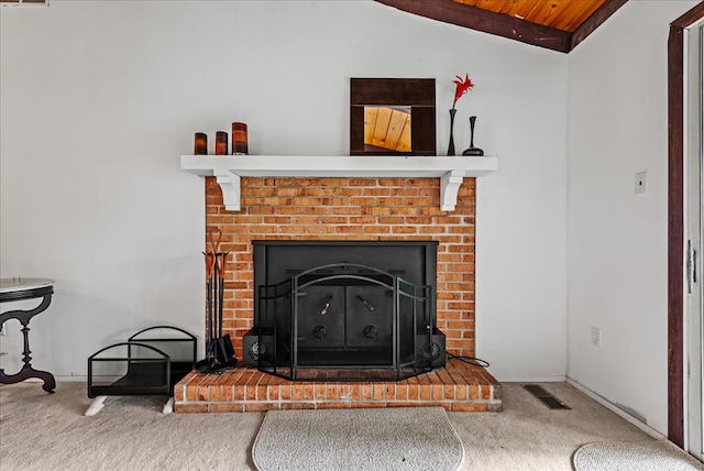 details featuring carpet floors and a brick fireplace