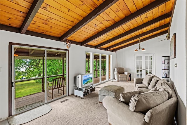 living room with beam ceiling, carpet flooring, ceiling fan, french doors, and wood ceiling