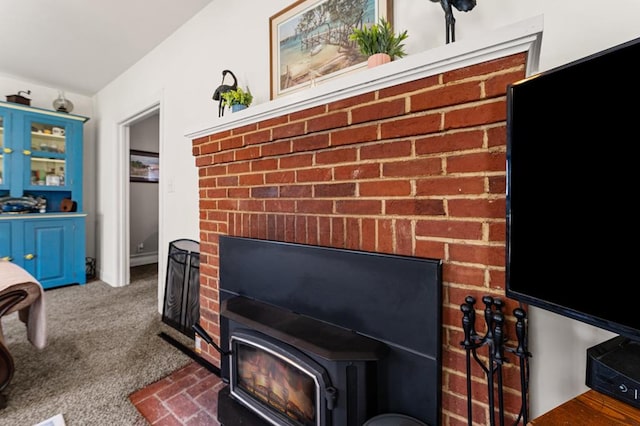 15498 Kings Hwy, Montross, VA 22520 - detailed view of a wood stove and carpet floors