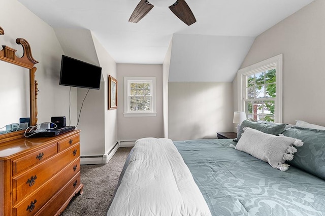 15498 Kings Hwy, Montross, VA 22520 - bedroom with carpet floors, lofted ceiling, multiple windows, a ceiling fan, and a baseboard heating unit