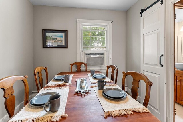 15498 Kings Hwy, Montross, VA 22520 - dining room with a barn door and cooling unit