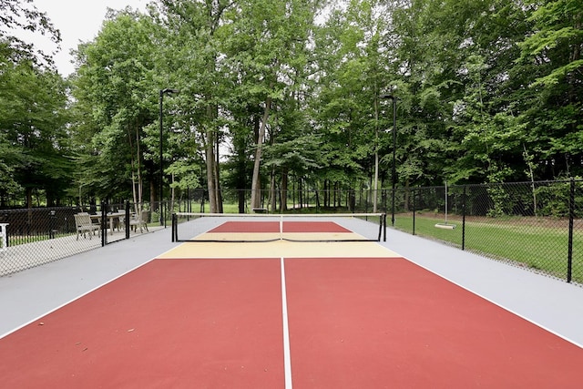 view of tennis court with basketball court