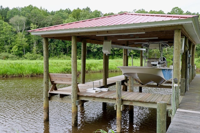 view of dock with a water view