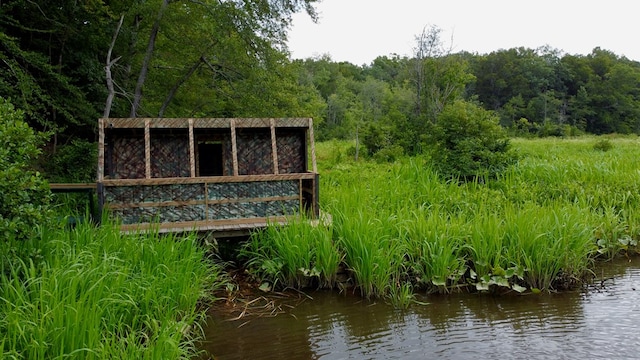 exterior space with a water view