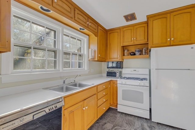 kitchen with sink and black appliances