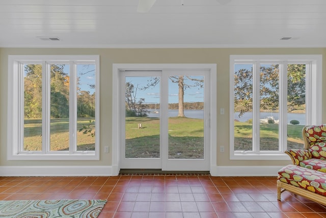 doorway to outside featuring tile patterned floors