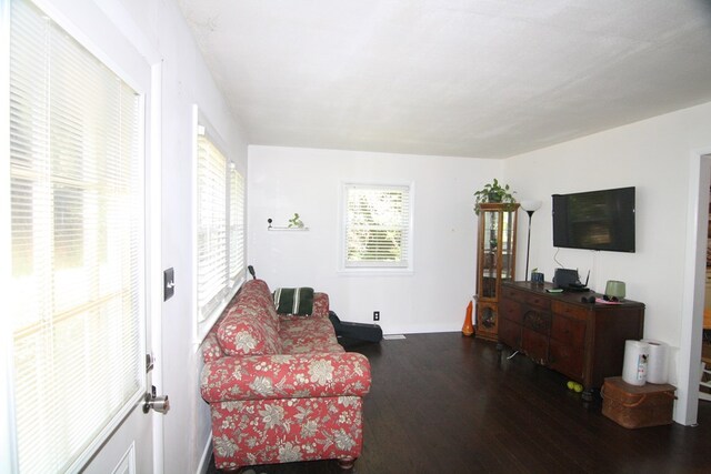 436 W Point Rd, Lancaster, VA 22503 - living room featuring dark wood-style floors and baseboards