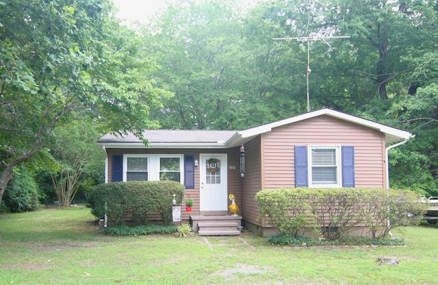 436 W Point Rd, Lancaster, VA 22503 - view of front facade featuring a front lawn