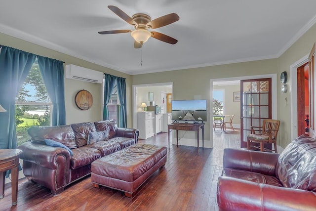 living room with crown molding, hardwood / wood-style floors, a wall mounted AC, a ceiling fan, and baseboards