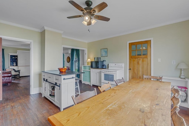 dining area featuring dark wood-type flooring, ornamental molding, an AC wall unit, a ceiling fan, and baseboards