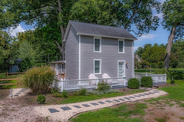 view of home's exterior with a deck