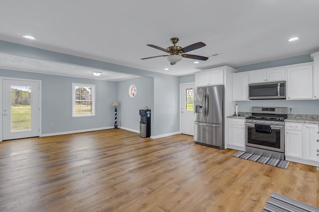 2920 Newmans Neck Rd, Heathsville, VA 22473 - kitchen featuring appliances with stainless steel finishes, baseboards, white cabinets, recessed lighting, and a ceiling fan