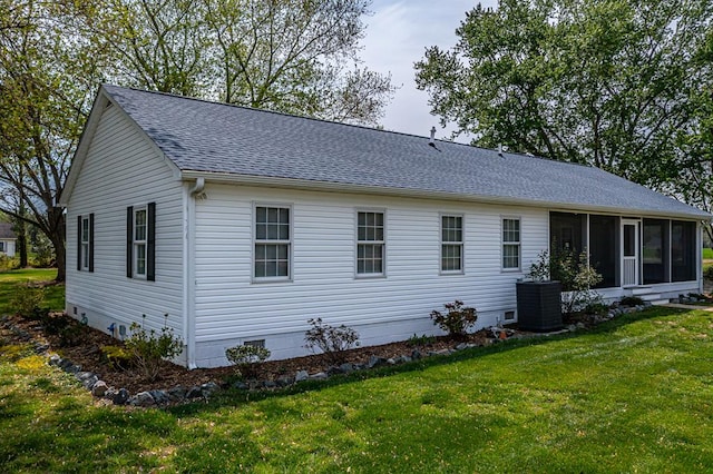 2920 Newmans Neck Rd, Heathsville, VA 22473 - rear view of house featuring a sunroom, central AC, roof with shingles, a lawn, and crawl space