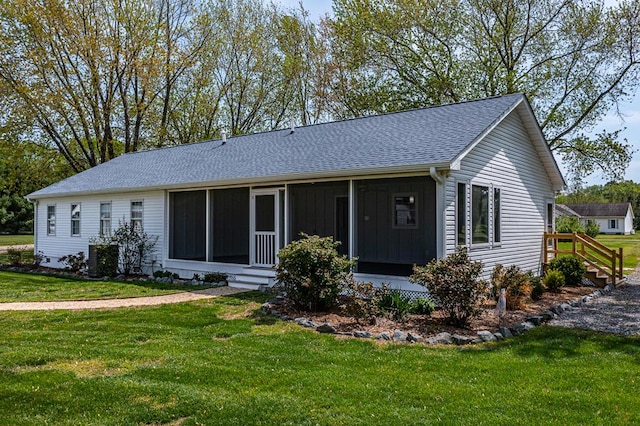 2920 Newmans Neck Rd, Heathsville, VA 22473 - single story home with a sunroom, a front yard, and a shingled roof