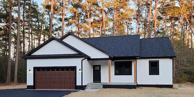 modern farmhouse style home with a garage