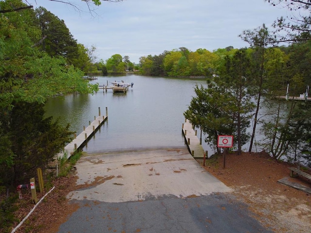 view of dock with a water view