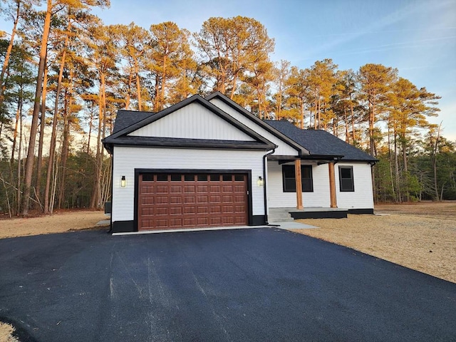 view of front of property with a garage