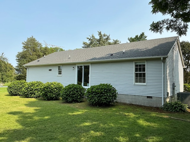 827 Travelers Rest Rd, Hague, VA 22469 - back of property featuring a lawn and roof with shingles