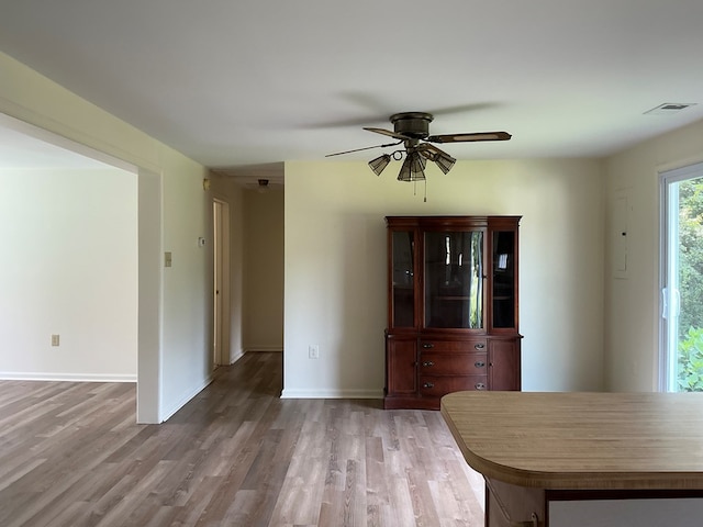 827 Travelers Rest Rd, Hague, VA 22469 - dining space featuring wood finished floors, ceiling fan, and electric panel