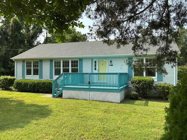 827 Travelers Rest Rd, Hague, VA 22469 - view of front of home featuring a front lawn, a deck, and a shingled roof
