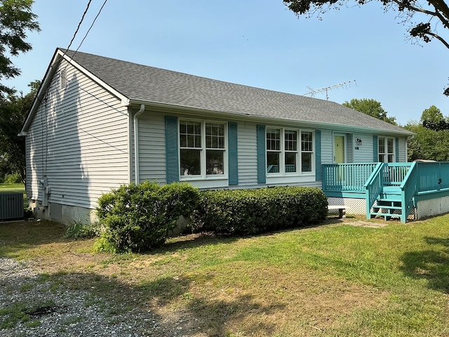 827 Travelers Rest Rd, Hague, VA 22469 - ranch-style house featuring a deck, a front lawn, and roof with shingles