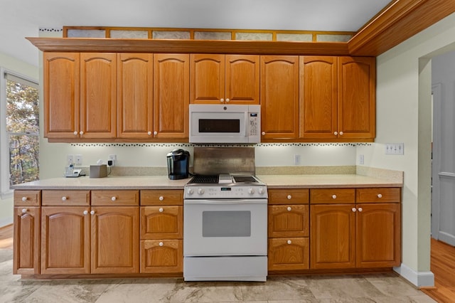 kitchen featuring white appliances