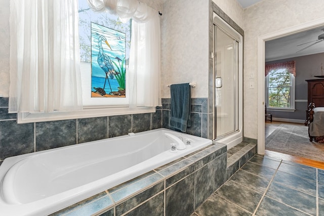 bathroom featuring tile patterned floors, ceiling fan, and shower with separate bathtub