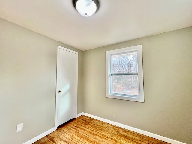 unfurnished room featuring light hardwood / wood-style flooring