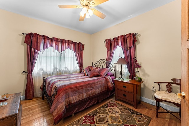 309 Nomini Bay Dr, Montross, VA 22520 - bedroom with wood finished floors and ceiling fan