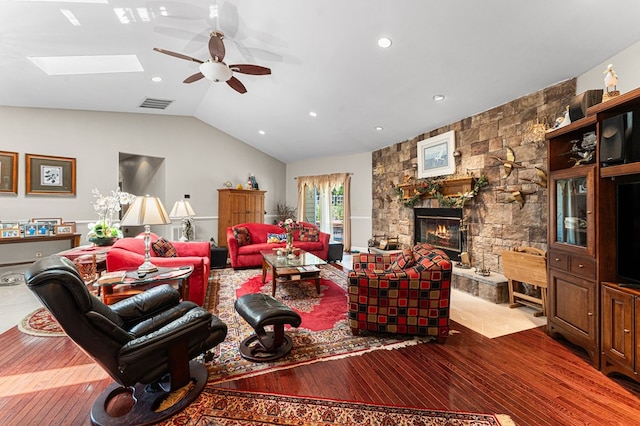 309 Nomini Bay Dr, Montross, VA 22520 - living area featuring ceiling fan, vaulted ceiling, wood-type flooring, a stone fireplace, and recessed lighting