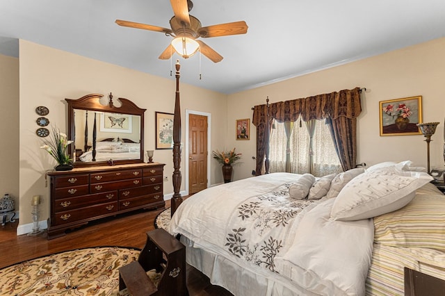 309 Nomini Bay Dr, Montross, VA 22520 - bedroom with dark wood-type flooring and ceiling fan