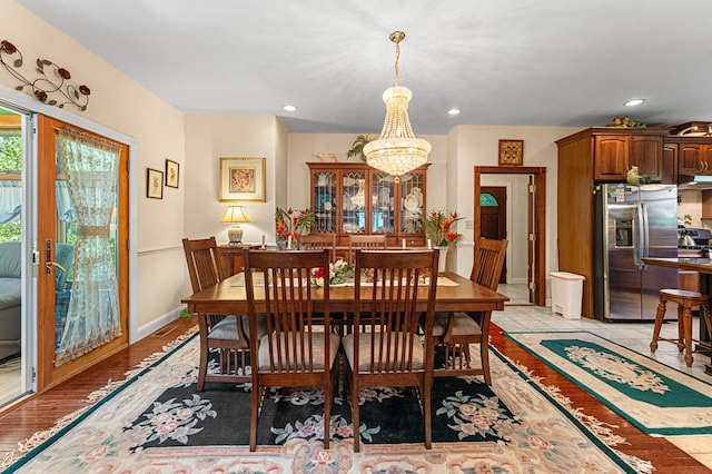 309 Nomini Bay Dr, Montross, VA 22520 - dining room with a chandelier, recessed lighting, and light wood-style floors