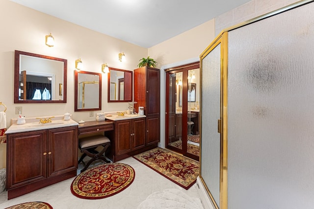 309 Nomini Bay Dr, Montross, VA 22520 - full bath featuring a shower stall, double vanity, and tile patterned flooring