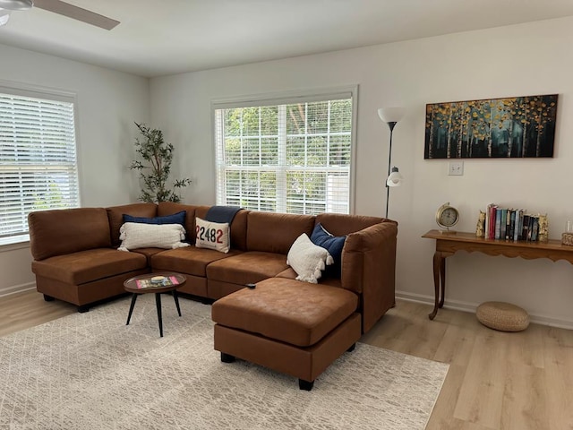 230 Roseneath Ave, Kilmarnock, VA 22482 - living area with light wood-type flooring, ceiling fan, and baseboards