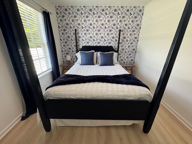 230 Roseneath Ave, Kilmarnock, VA 22482 - bedroom with light wood finished floors and baseboards