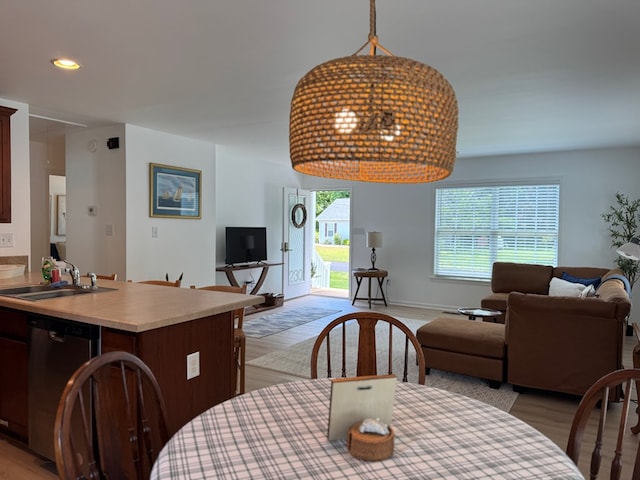 230 Roseneath Ave, Kilmarnock, VA 22482 - dining room featuring light wood-type flooring, baseboards, and recessed lighting
