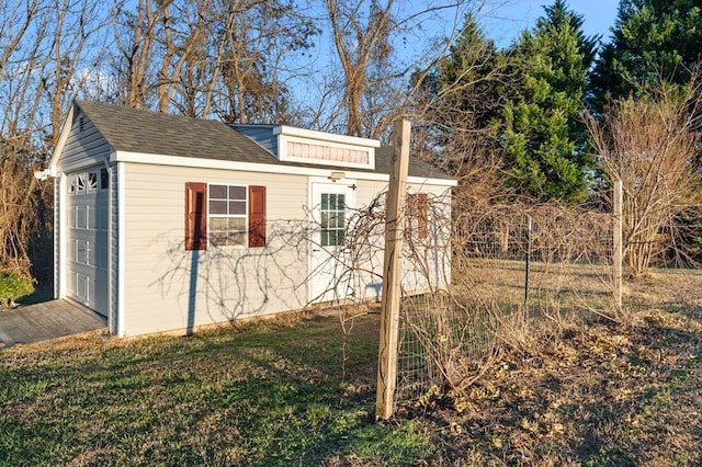 view of side of home featuring a garage