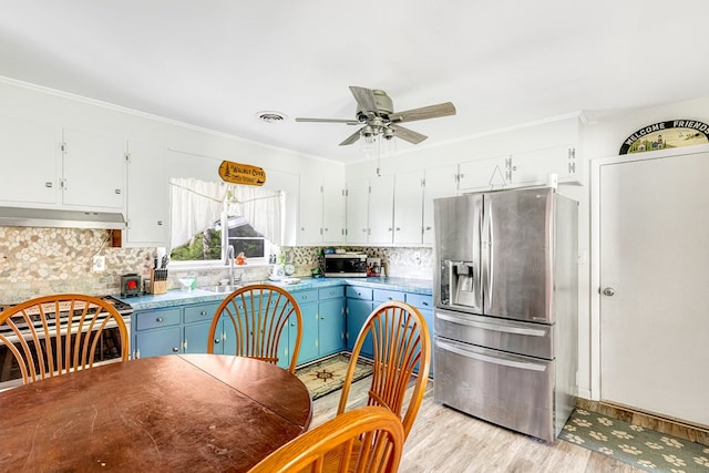 62 Denver Rd, Heathsville, VA 22473 - kitchen featuring stainless steel appliances, under cabinet range hood, ceiling fan, light wood finished floors, and white cabinets