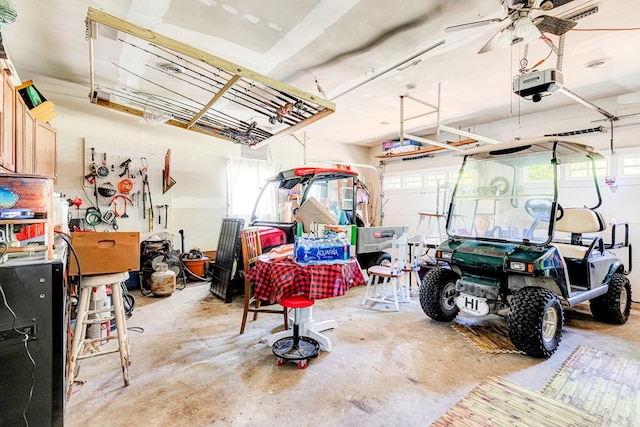 62 Denver Rd, Heathsville, VA 22473 - garage featuring a garage door opener and ceiling fan