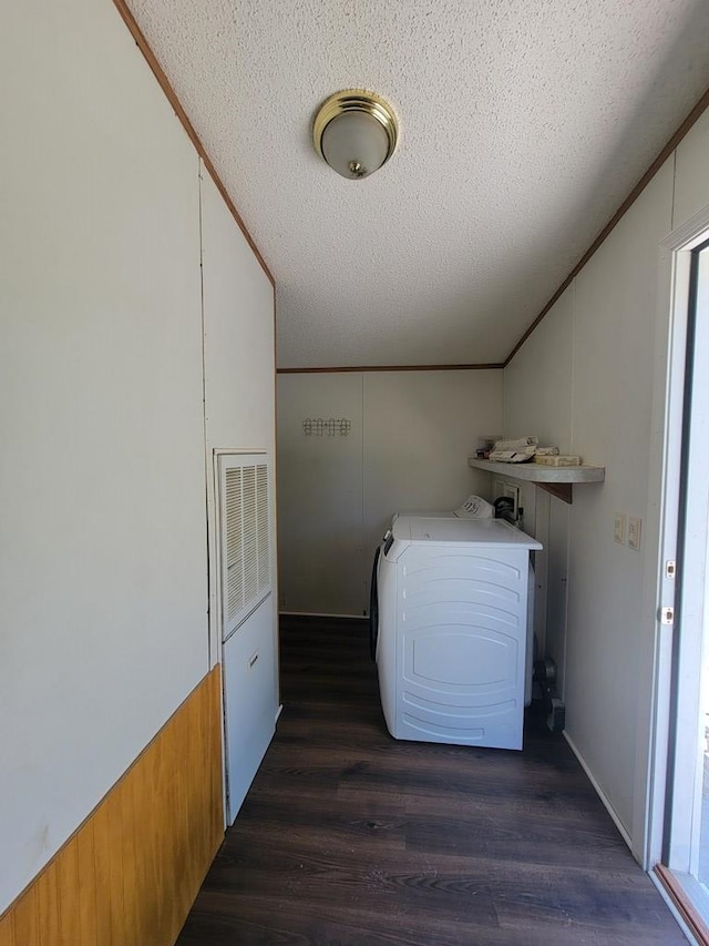 159 Dirt Bridge Rd, Topping, VA 23169 - laundry room featuring washer / clothes dryer, a textured ceiling, dark wood-type flooring, and healthy amount of natural light