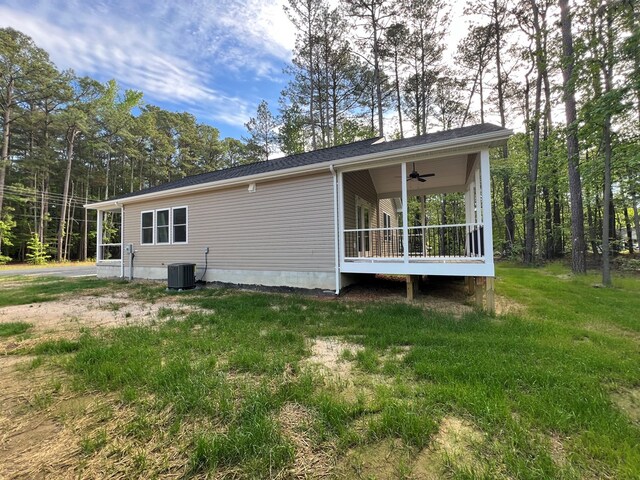 366 N Glebe Rd, Montross, VA 22520 - view of side of property featuring a ceiling fan, central AC, and a yard