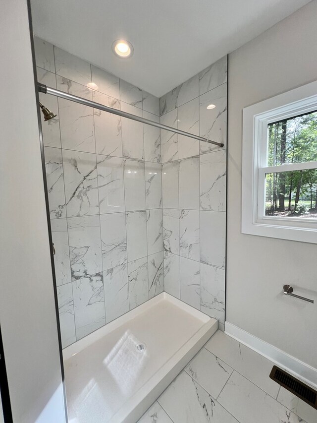 366 N Glebe Rd, Montross, VA 22520 - full bathroom with a stall shower, marble look tile flooring, and baseboards