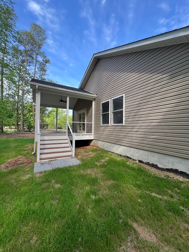 366 N Glebe Rd, Montross, VA 22520 - rear view of property featuring a yard and ceiling fan