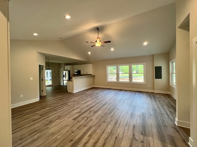366 N Glebe Rd, Montross, VA 22520 - unfurnished living room featuring dark wood-type flooring, vaulted ceiling, a ceiling fan, recessed lighting, and electric panel